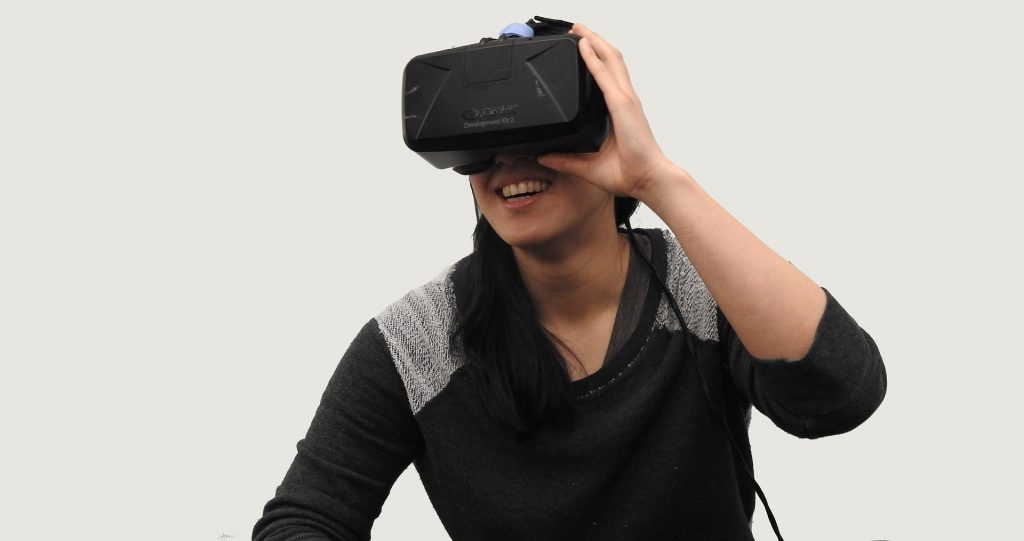 woman looking through VR