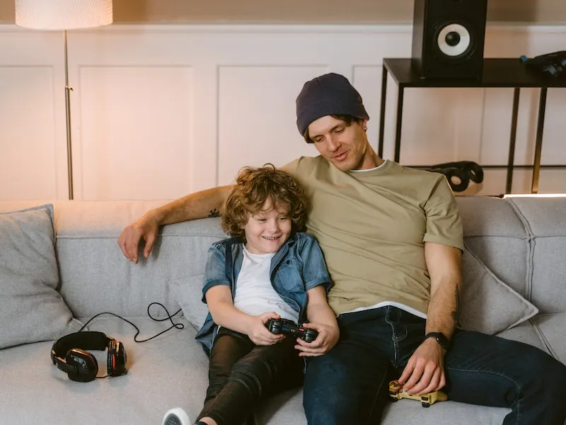 father and son playing game